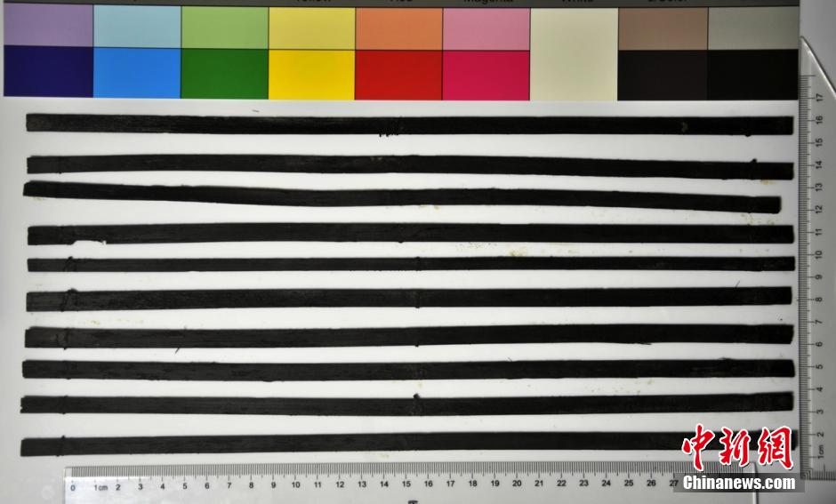 圖為漢代簡牘出土930支竹簡，在四川地區(qū)首次發(fā)現(xiàn)漢代簡牘。