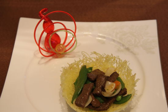 雀巢爆羊柳。 花惠生 供圖