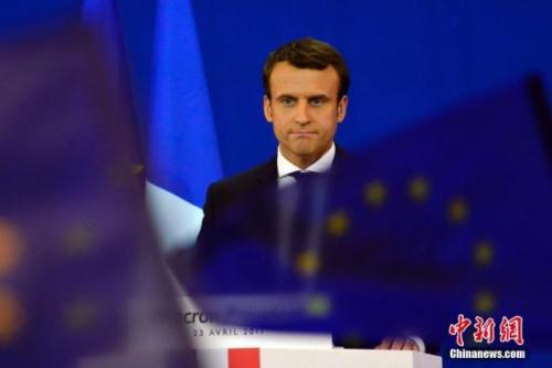 圖為馬克龍?jiān)趹c祝集會上。中新社記者 龍劍武 攝
